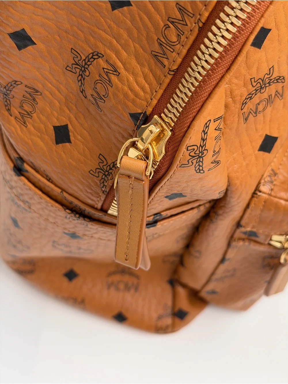 MCM 100% Authentic Stark Side Studs Backpack In Visetos Size Medium Cognac Color